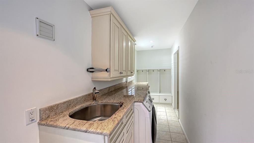 4810 Bay Shore Road Sarasota, FL 34234 - Photo 36 of 47 a bathroom with a sink and a toilet