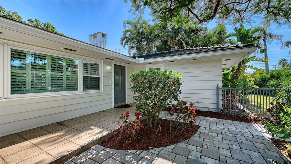 4810 Bay Shore Road Sarasota, FL 34234 - Photo 7 of 47 a view of a couches in the patio