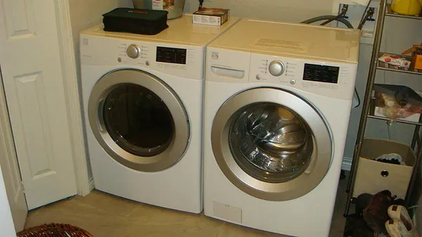 a utility room with dryer and washer