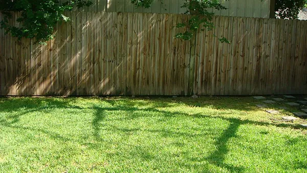 a view of backyard with tub