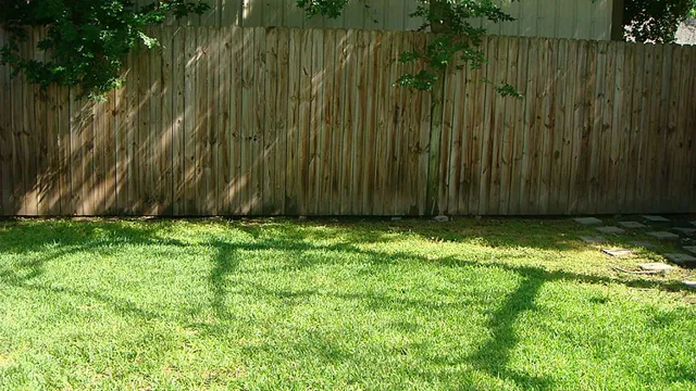 a view of backyard with tub