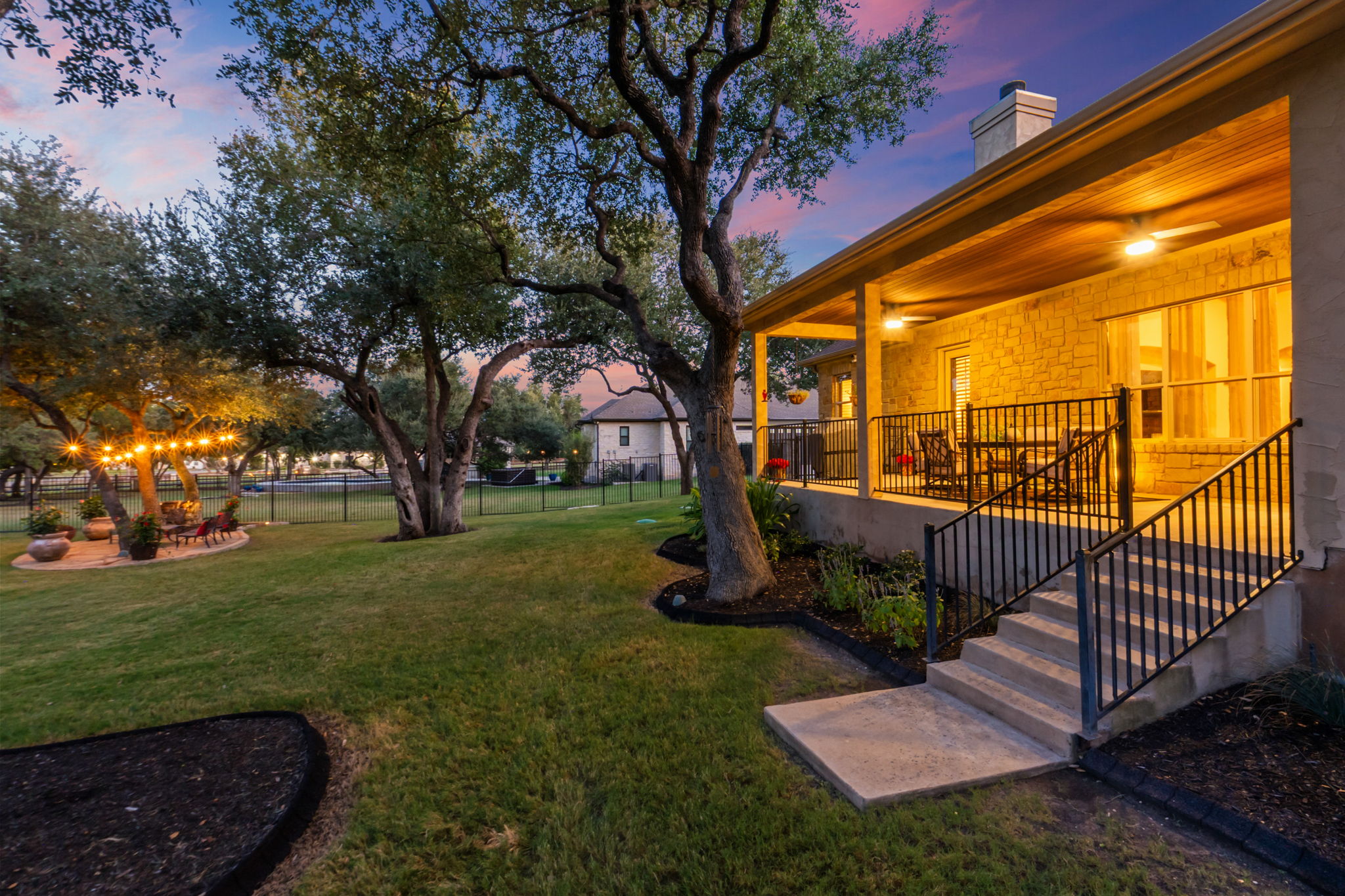104 Vista Lane Georgetown, TX 78633 - Photo 30 of 36 The elegance continues out on the back patio overseeing one of the nicest lots in the community.