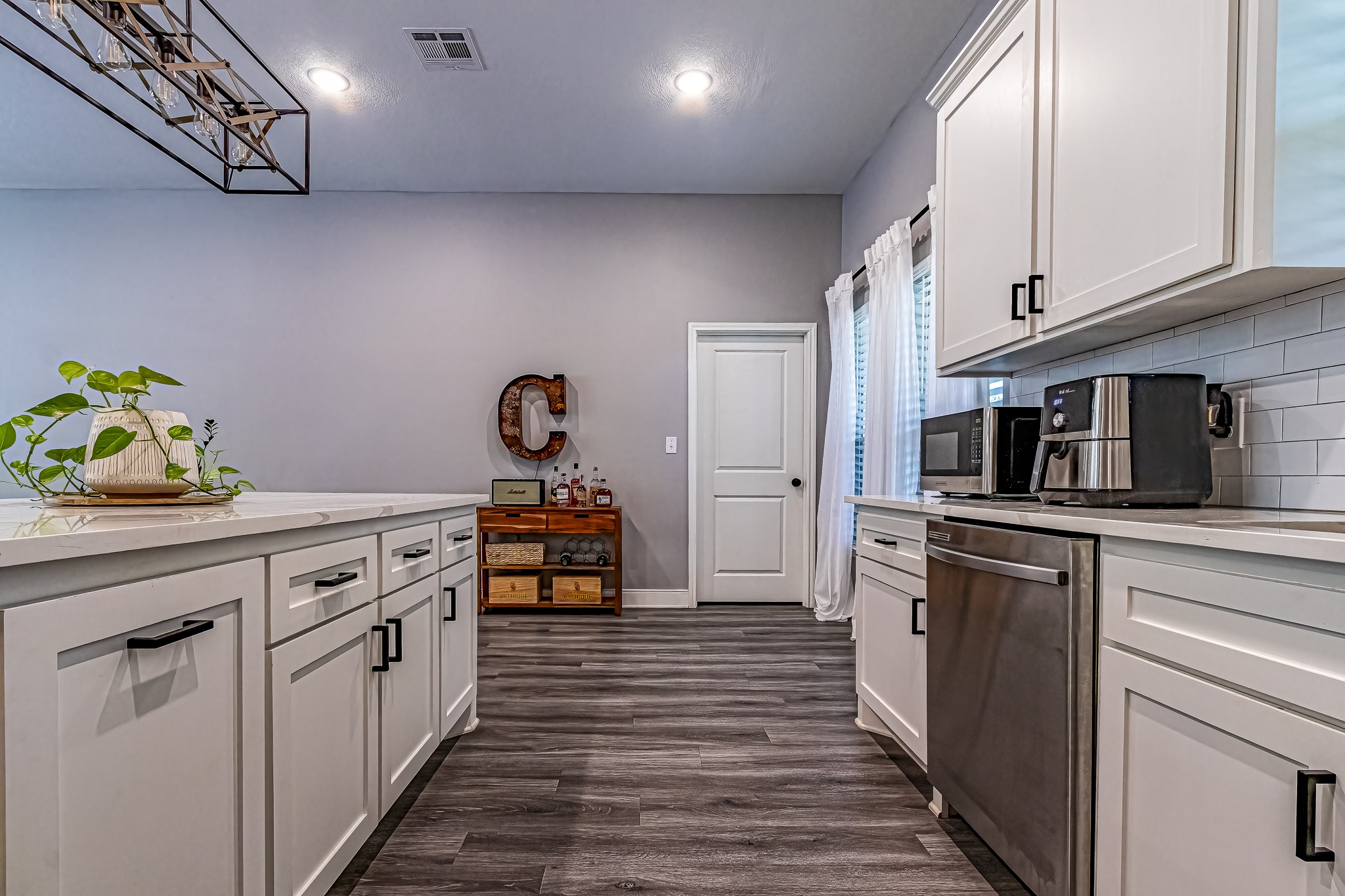 40 Bob Steele Road Coldspring, TX 77331 - Photo 11 of 50 a kitchen with stainless steel appliances granite countertop a sink a stove and cabinets