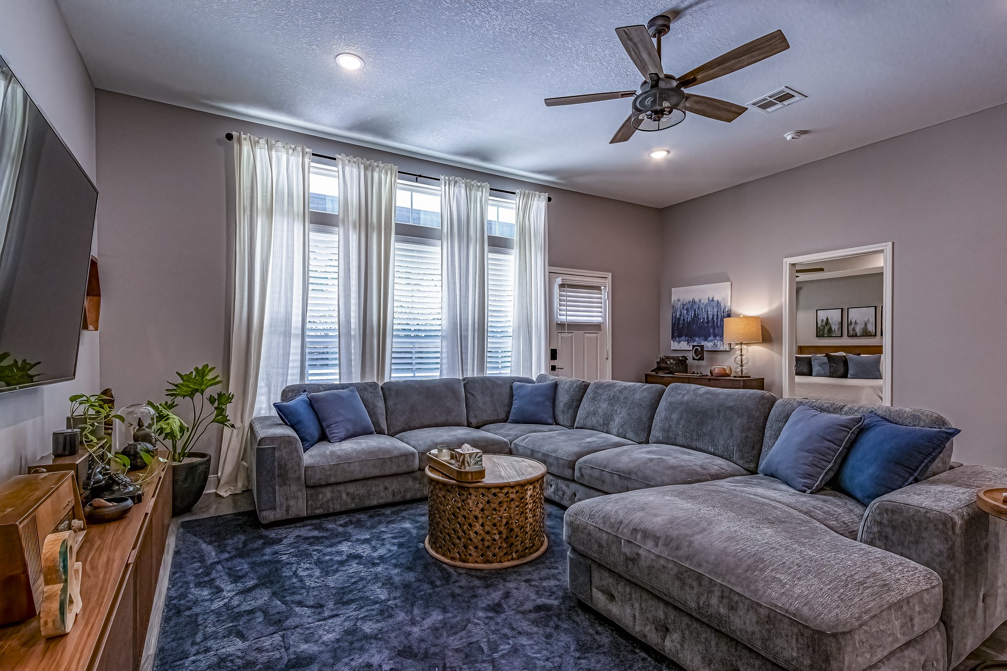 40 Bob Steele Road Coldspring, TX 77331 - Photo 17 of 50 a living room with furniture and a large window