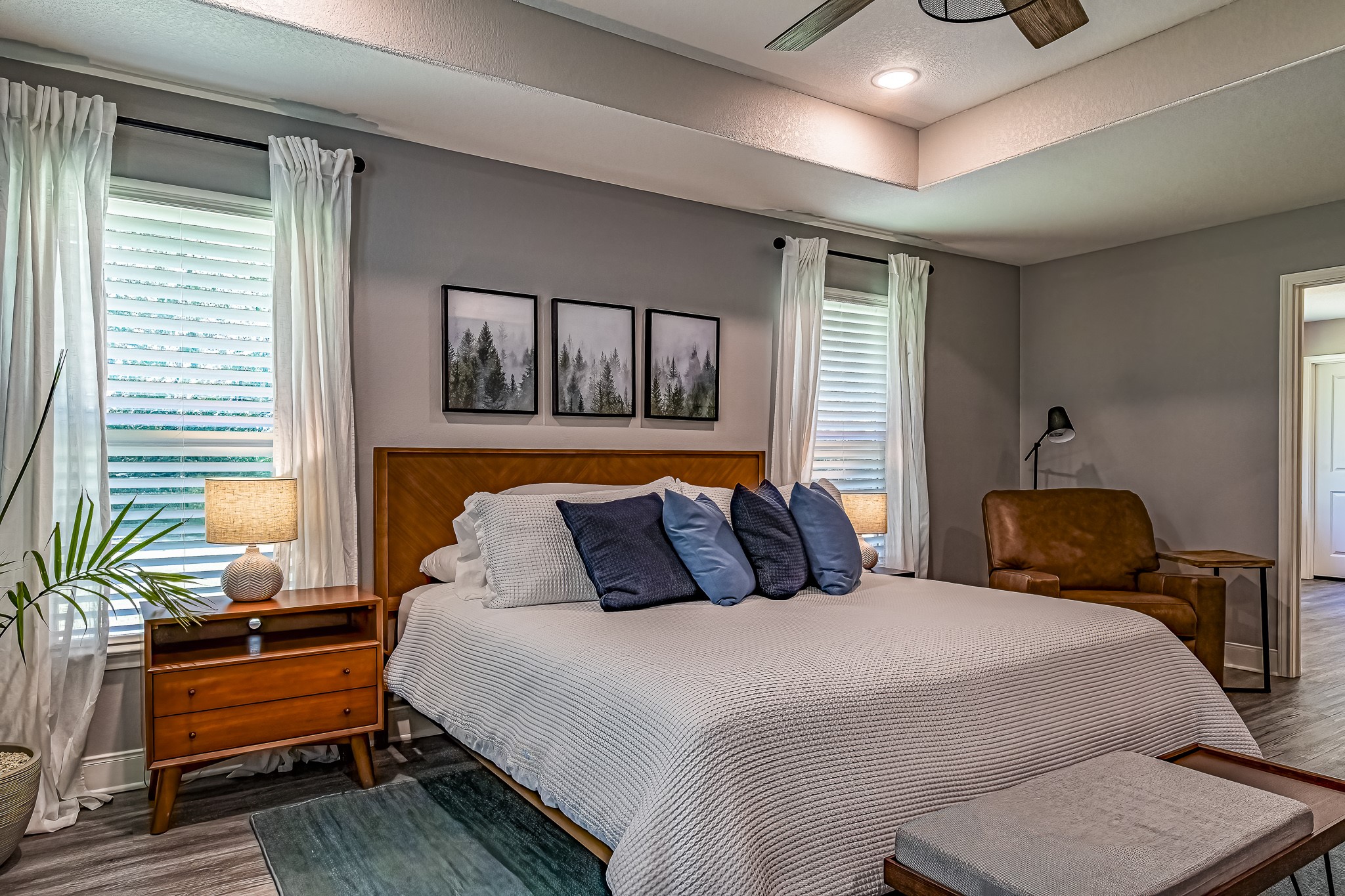 40 Bob Steele Road Coldspring, TX 77331 - Photo 21 of 50 a bedroom with beds and a potted plant