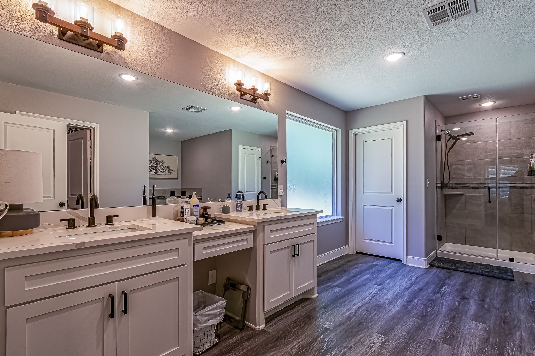 40 Bob Steele Road Coldspring, TX 77331 - Photo 22 of 50 a room with stainless steel appliances kitchen island granite countertop a sink cabinets and wooden floor