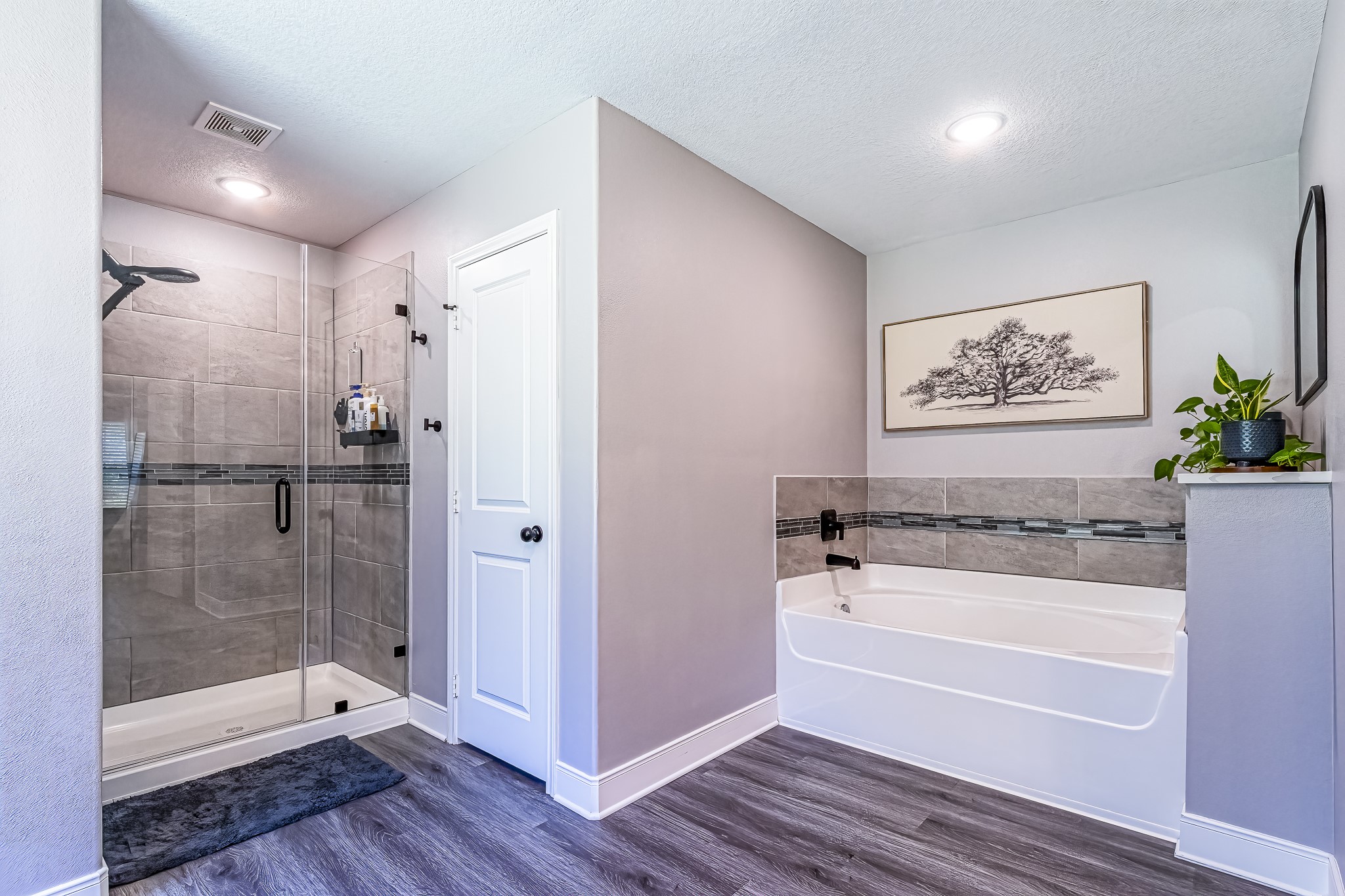 40 Bob Steele Road Coldspring, TX 77331 - Photo 23 of 50 a bathroom with a bathtub and a shower