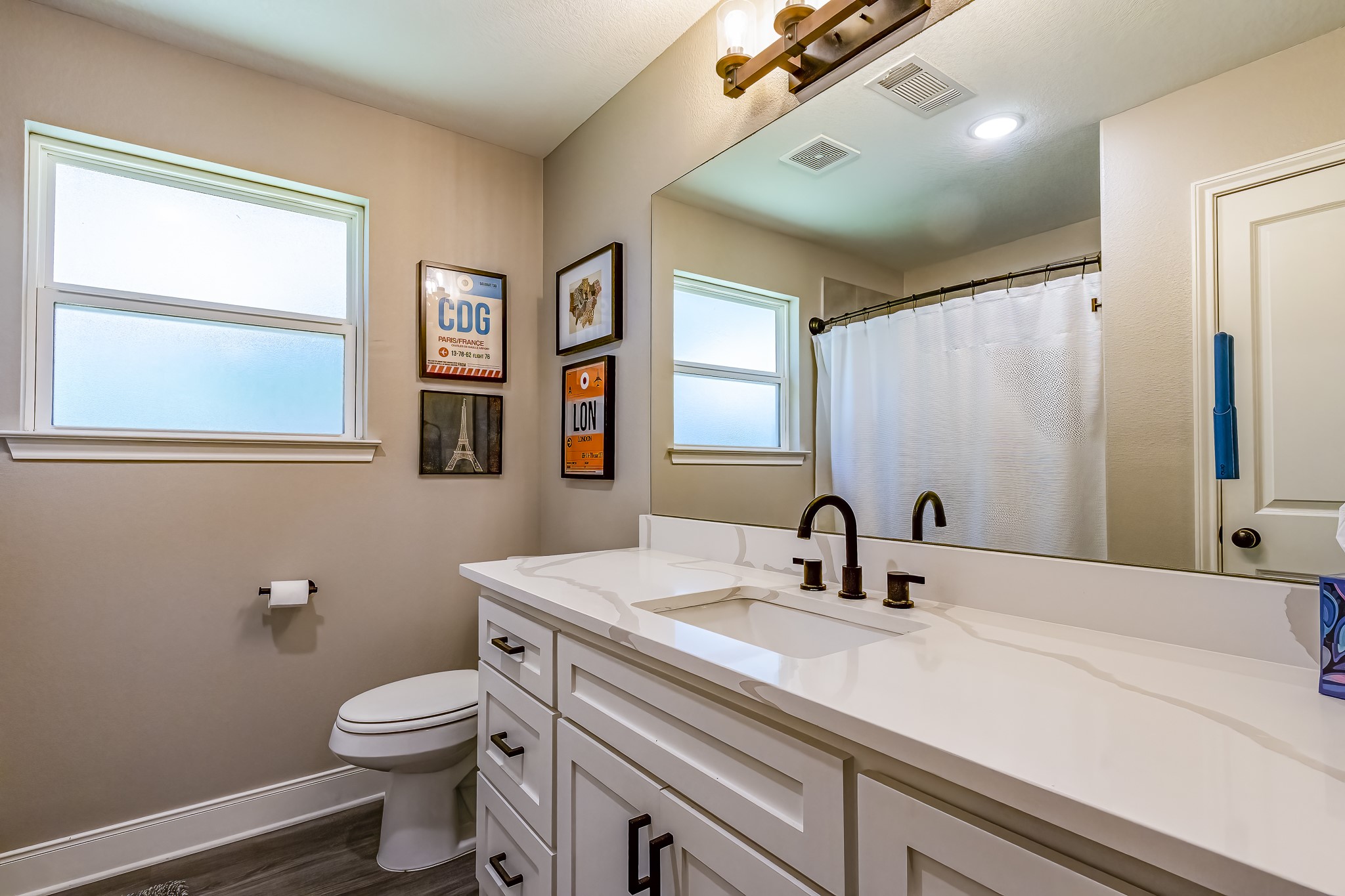 40 Bob Steele Road Coldspring, TX 77331 - Photo 27 of 50 a bathroom with a toilet sink and mirror