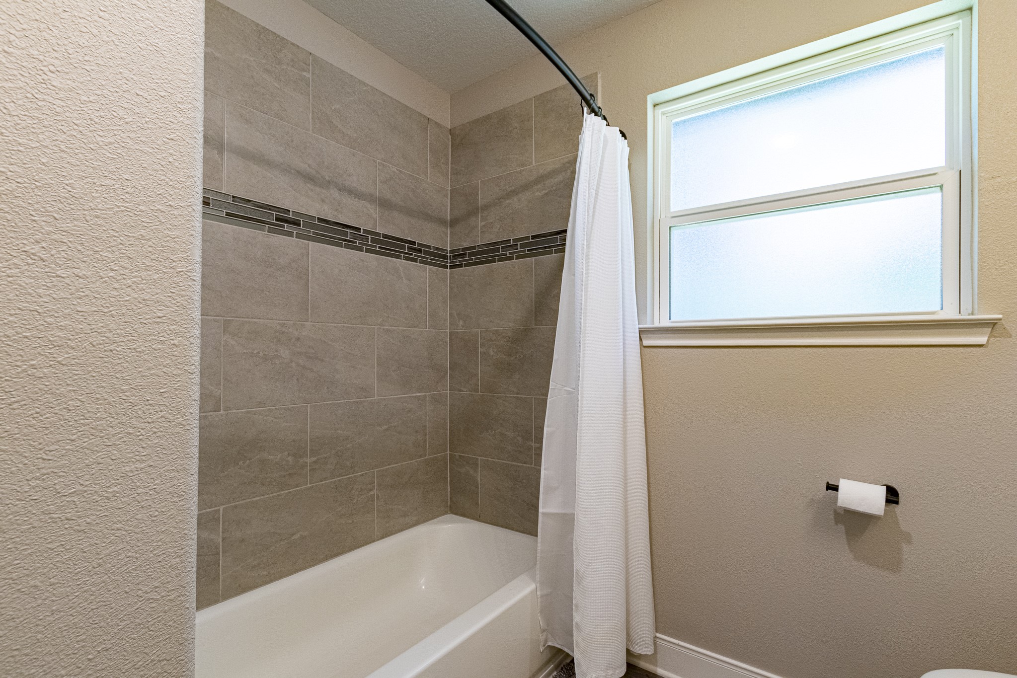 40 Bob Steele Road Coldspring, TX 77331 - Photo 28 of 50 a bathroom with a shower and a bath tub