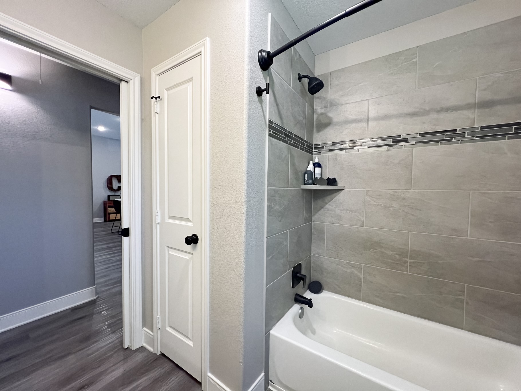 40 Bob Steele Road Coldspring, TX 77331 - Photo 29 of 50 a bathroom with a bathtub and a shower