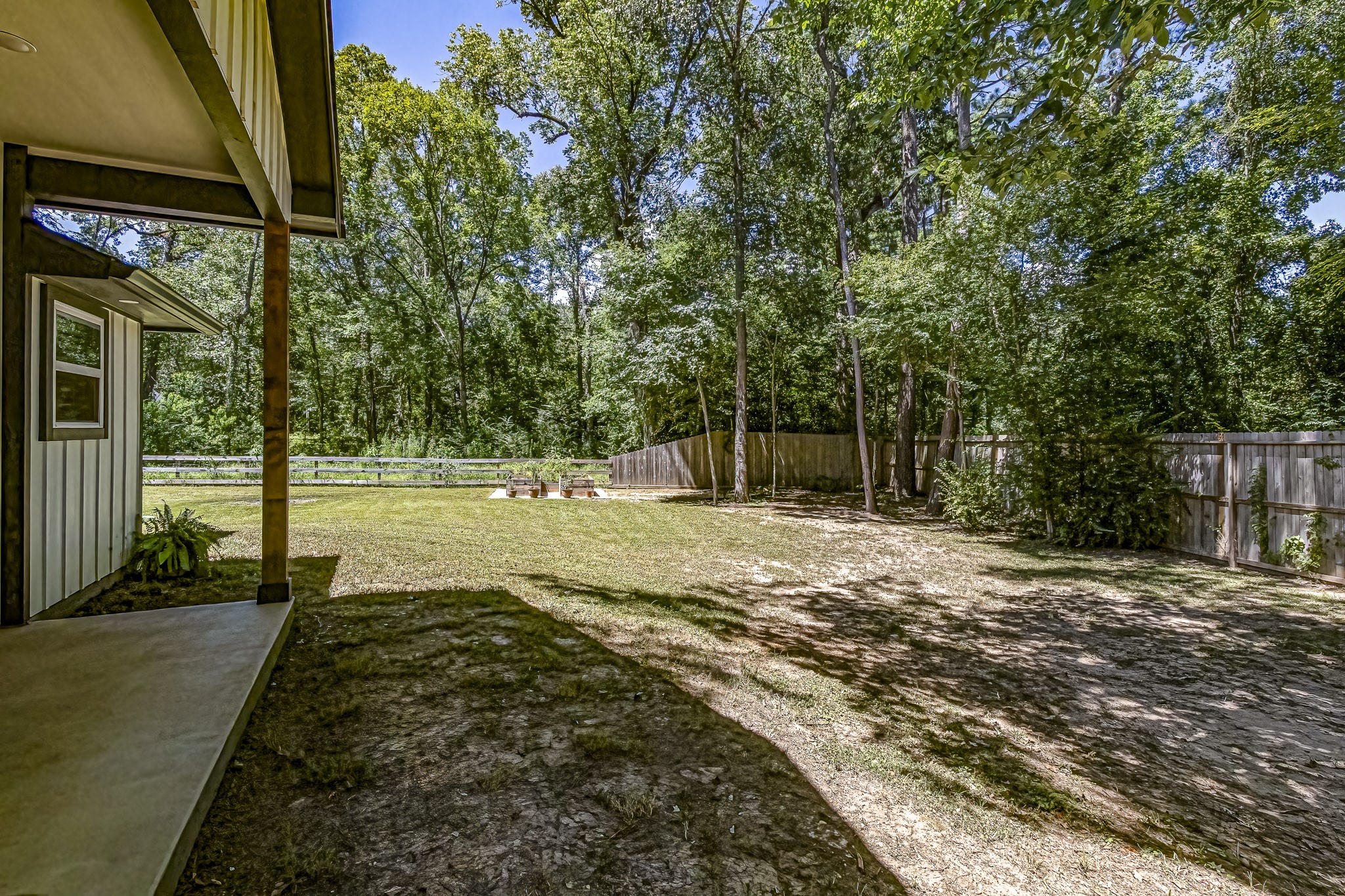 40 Bob Steele Road Coldspring, TX 77331 - Photo 36 of 50 a view of a yard with plants and trees