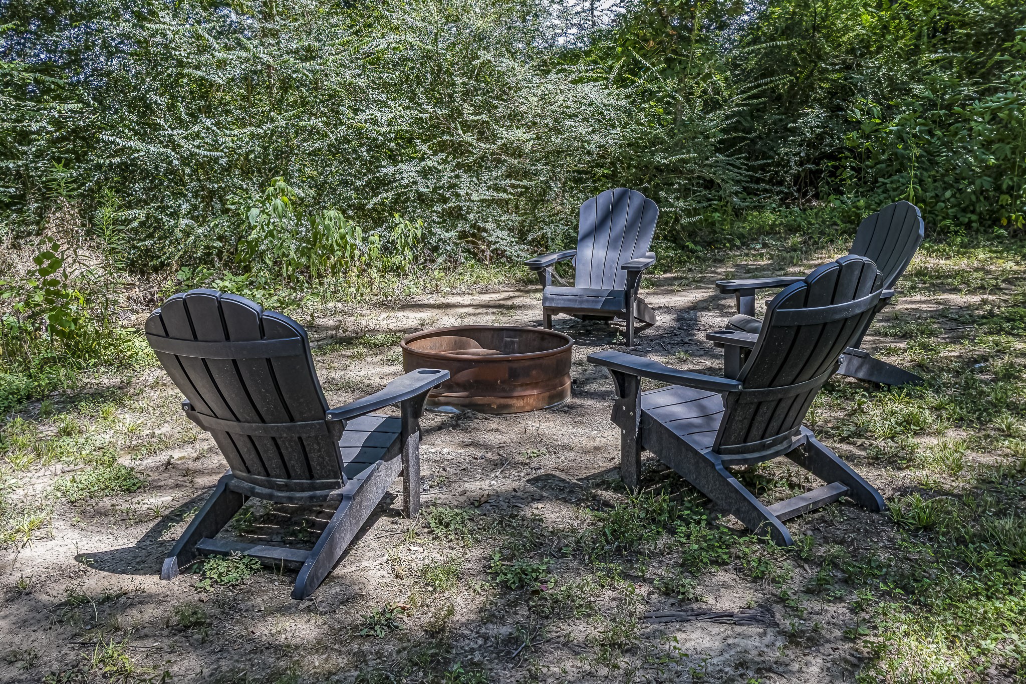 40 Bob Steele Road Coldspring, TX 77331 - Photo 38 of 50 a view of a backyard with sitting area