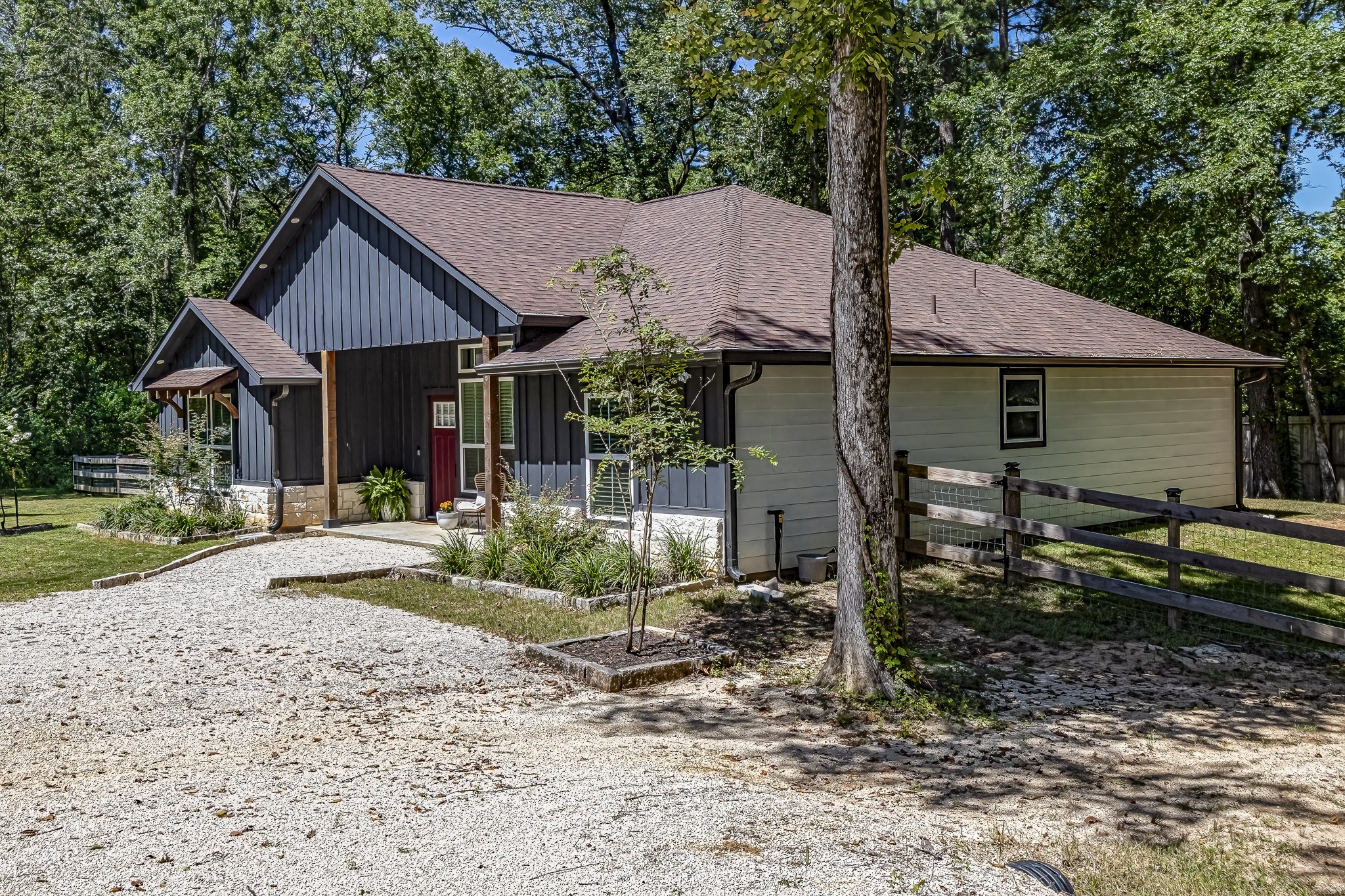 40 Bob Steele Road Coldspring, TX 77331 - Photo 3 of 50 a house view with a garden space