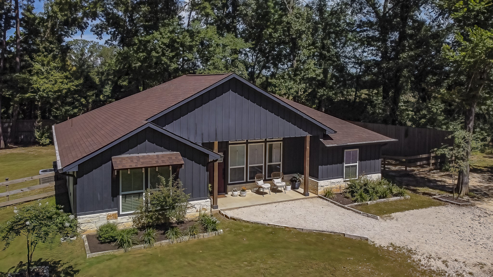 40 Bob Steele Road Coldspring, TX 77331 - Photo 46 of 50 a front view of a house with yard and green space