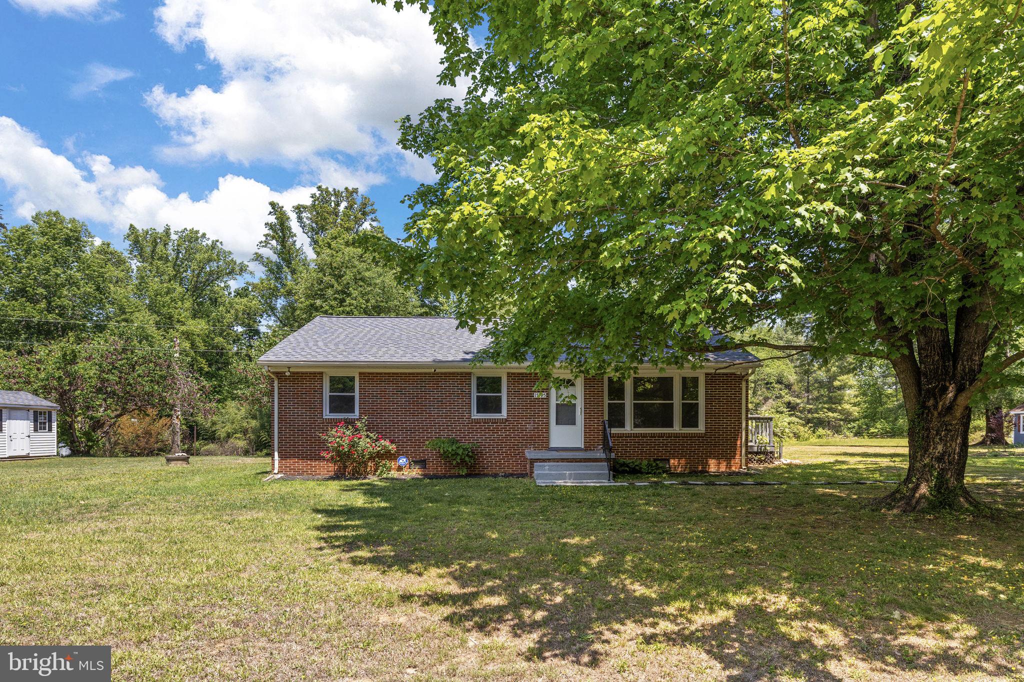 17195 Oakshade Road Orange, VA 22960 - Photo 3 of 31 Charming brick home in lush greenery.