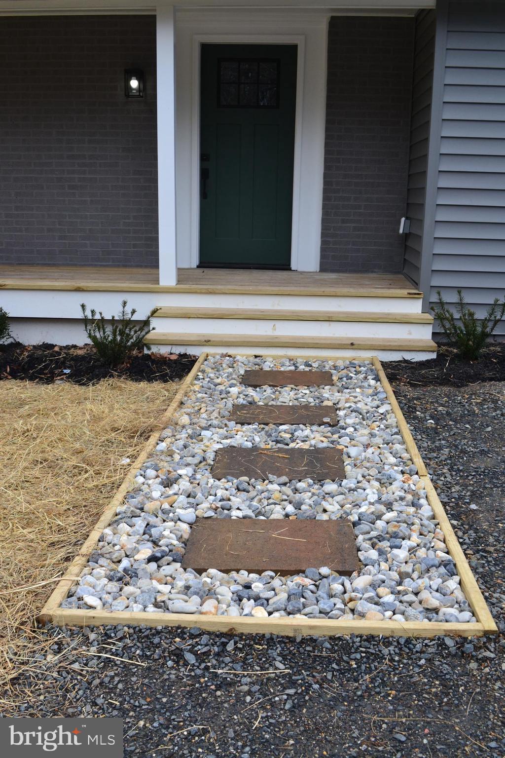 125 Cove Point Road Lusby, MD 20657 - Photo 11 of 32 Added walkway and landscaping for extra cuteness