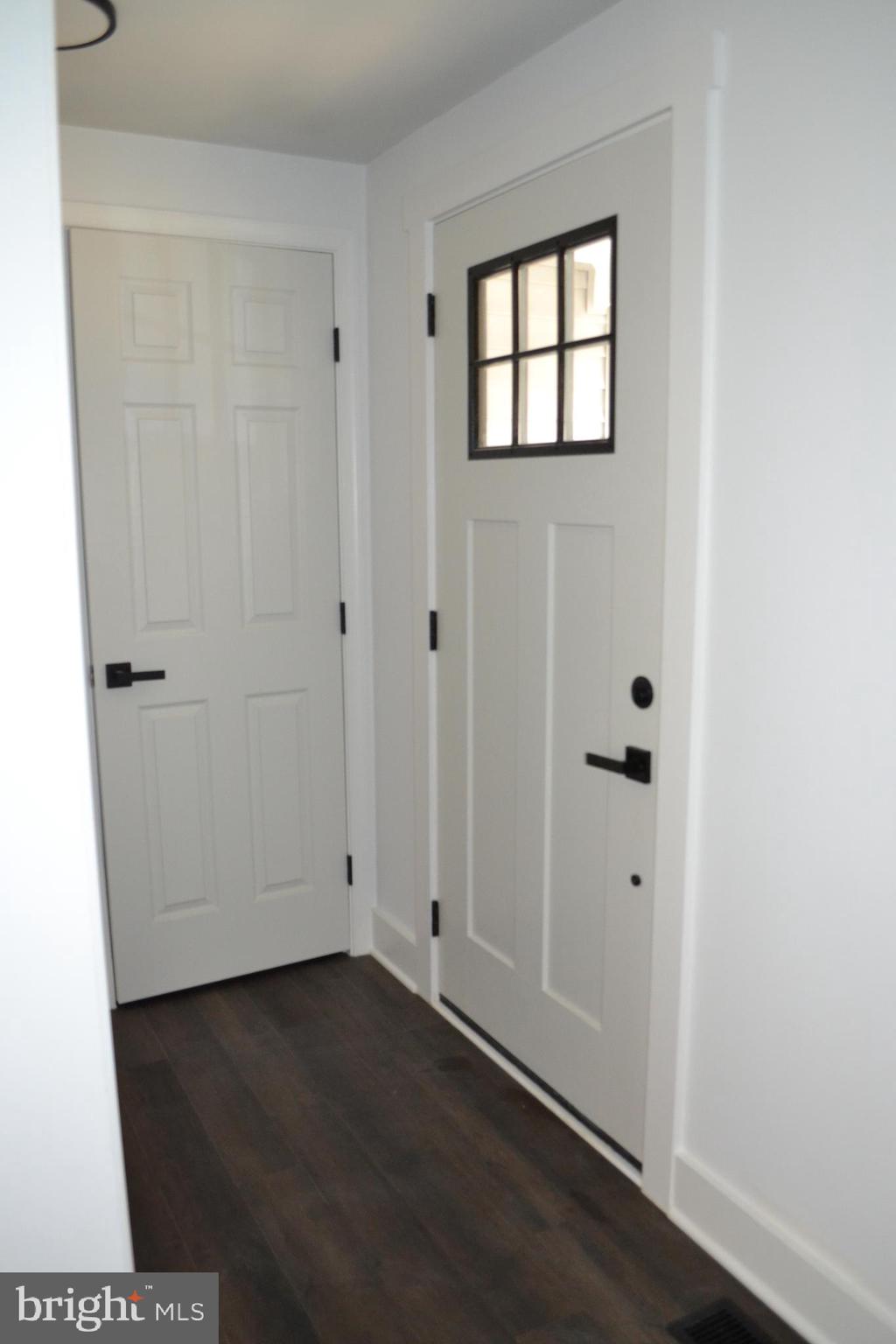 125 Cove Point Road Lusby, MD 20657 - Photo 12 of 32 Inside of the front door. All black hardware