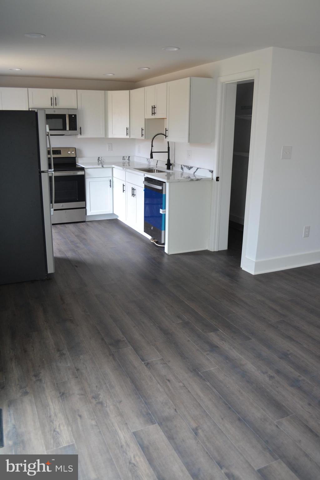 125 Cove Point Road Lusby, MD 20657 - Photo 17 of 32 Beautiful QUARTZ countertops.