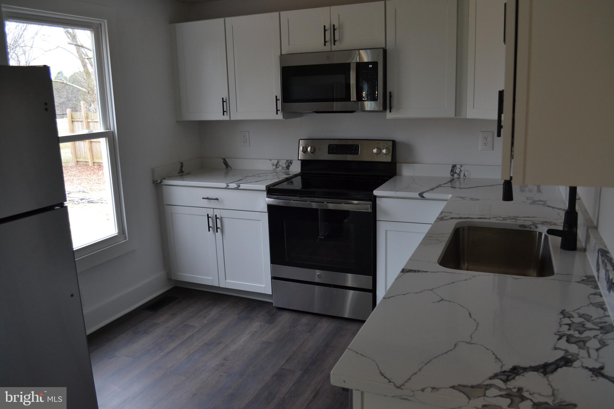 125 Cove Point Road Lusby, MD 20657 - Photo 18 of 32 Brand new stainless steel appliances