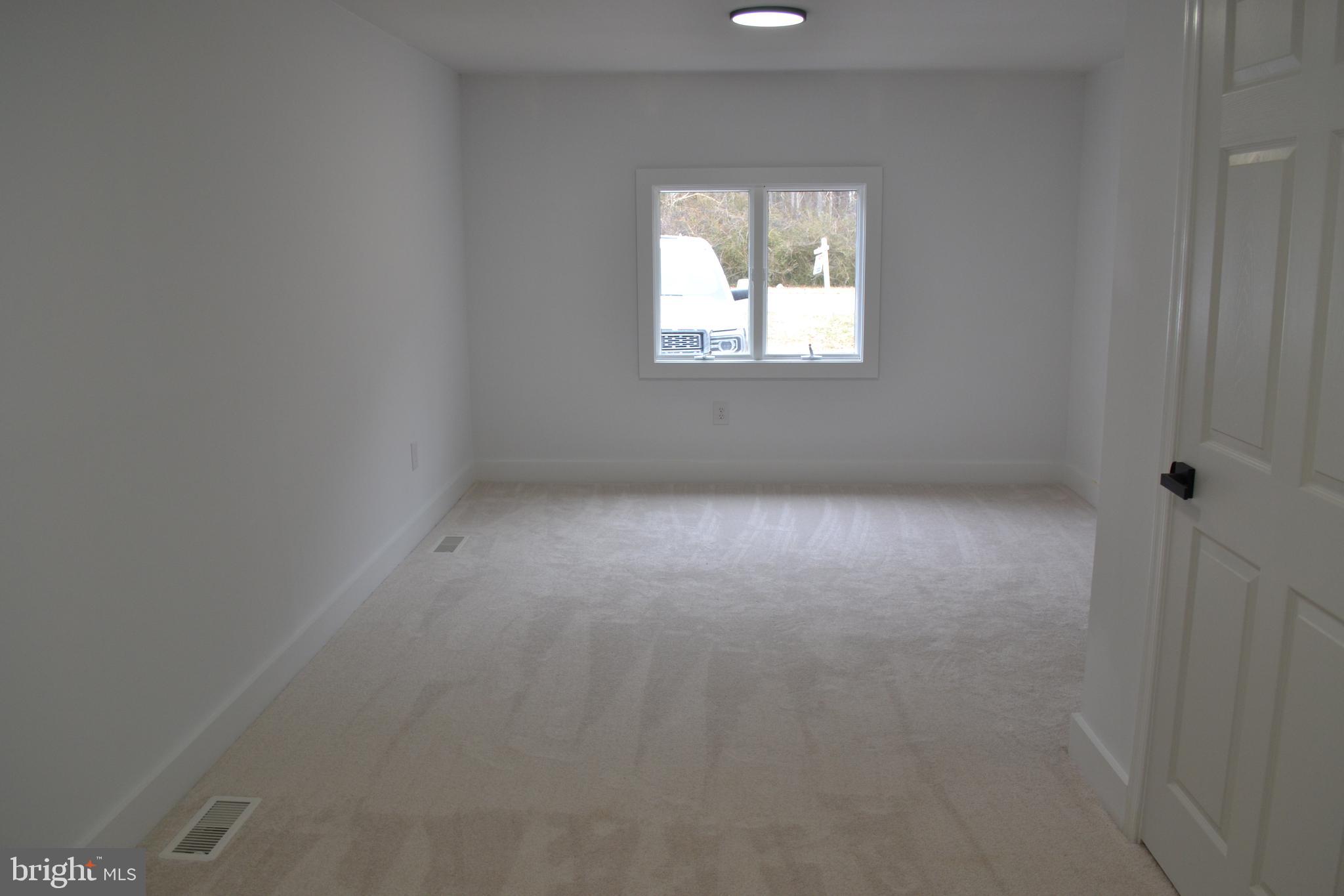 125 Cove Point Road Lusby, MD 20657 - Photo 20 of 32 Lower level Bonus room
