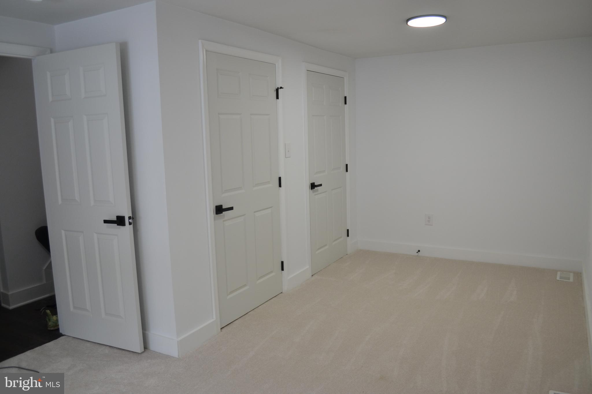 125 Cove Point Road Lusby, MD 20657 - Photo 21 of 32 Lower level bonus room with large closet & laundry
