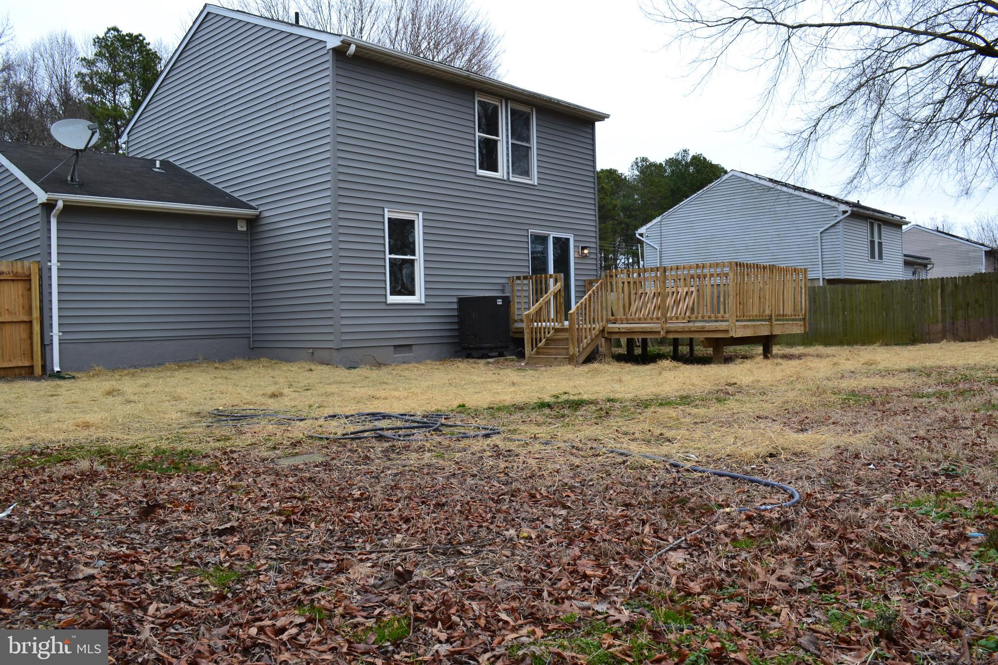 125 Cove Point Road Lusby, MD 20657 - Photo 8 of 32 Yard backs to Chesapeake Hills Golf Course.