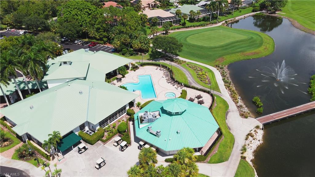 3641 Periwinkle Way Naples, FL 34114 - Photo 42 of 45 an aerial view of a swimming pool and outdoor space