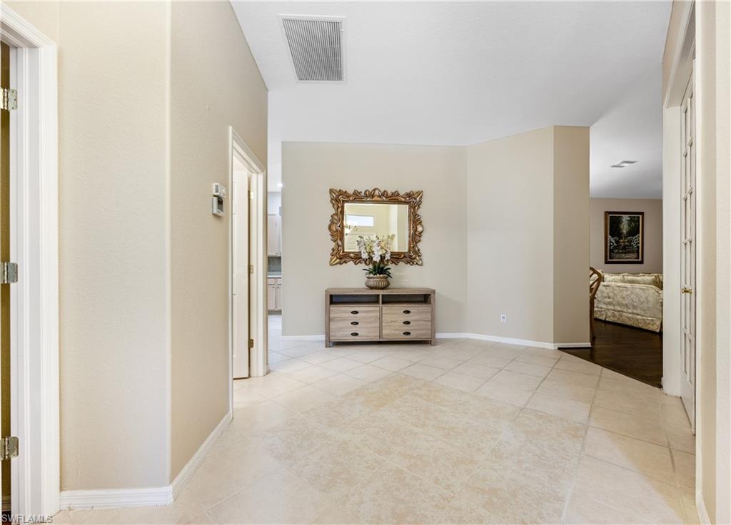 3641 Periwinkle Way Naples, FL 34114 - Photo 5 of 45 a view of a livingroom with a furniture