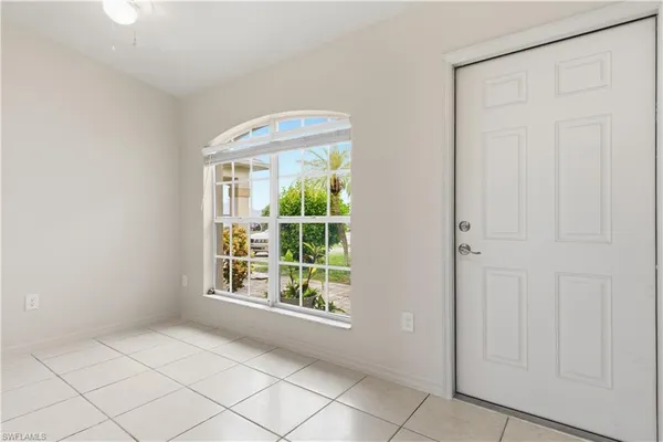 an empty room with windows