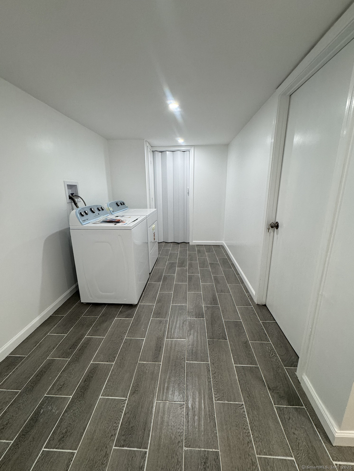 100 Media Avenue, Unit 1 Waterbury, CT 06708 - Photo 7 of 9 a view of an empty room with a window