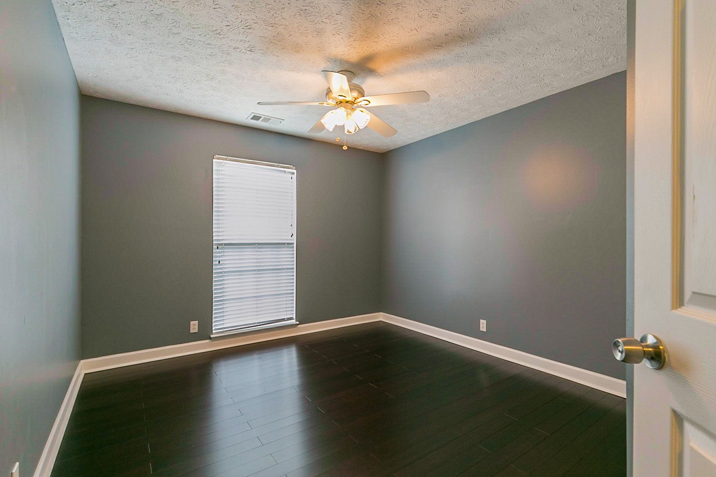 409 Ashby Place Antioch, TN 37013 - Photo 18 of 26 wooden floor in an empty room with a window