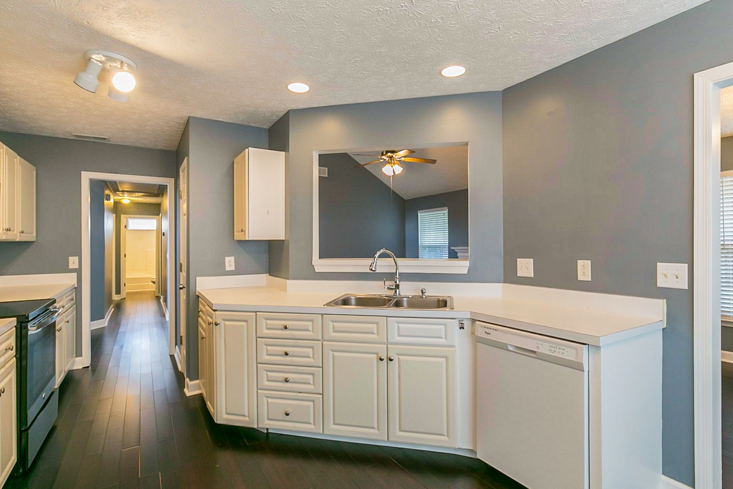409 Ashby Place Antioch, TN 37013 - Photo 7 of 26 a spacious bathroom with a double vanity sink and a mirror