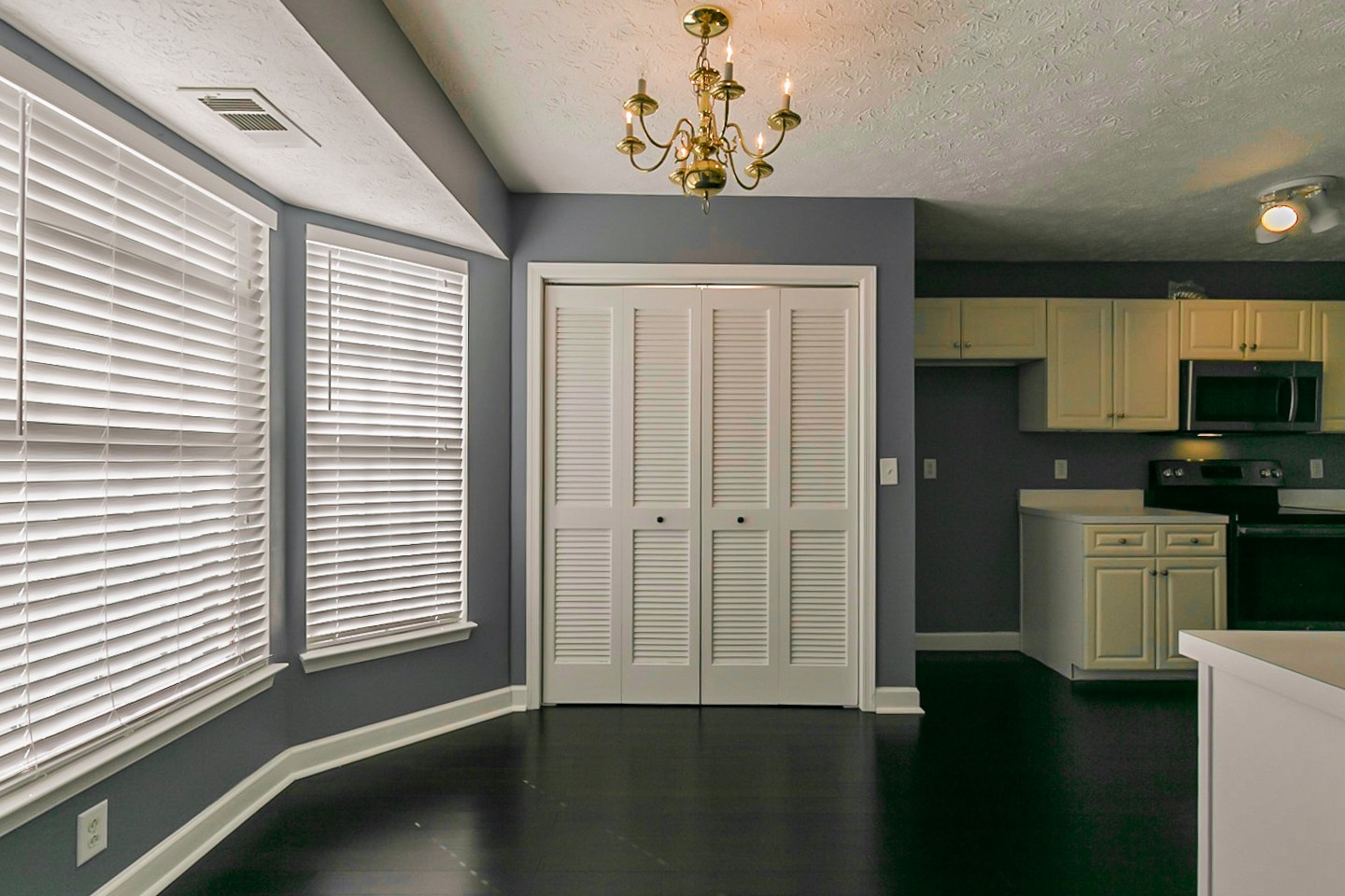 409 Ashby Place Antioch, TN 37013 - Photo 9 of 26 a view of a kitchen with a dishwasher cabinets and a window