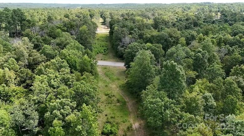 0 Blue Branch Road, Unit TRACT B Gaffney, SC 29340 - Photo 6 of 11 an aerial view of residential house with outdoor space and trees all around