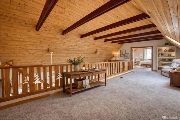 a view of a porch with wooden stairs