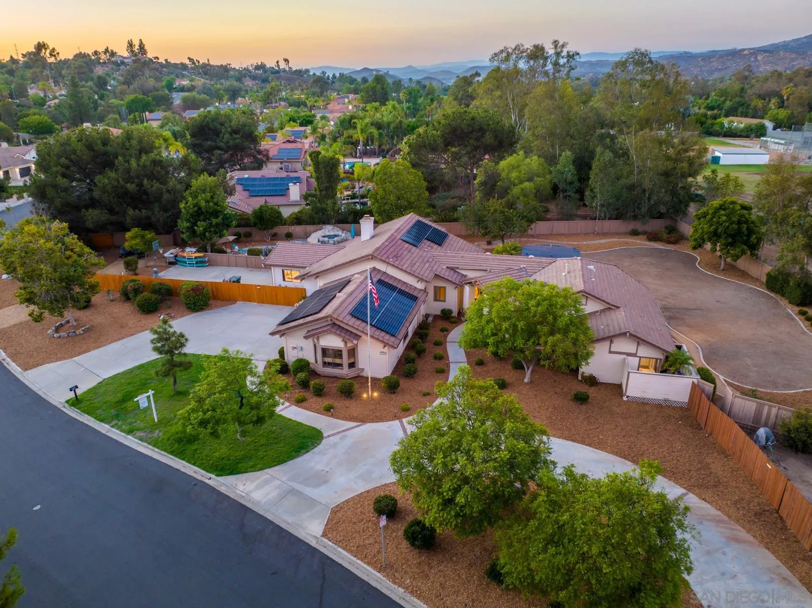 15735 Riparian Road Poway, CA 92064 - Photo 1 of 53 an aerial view of a house with a garden