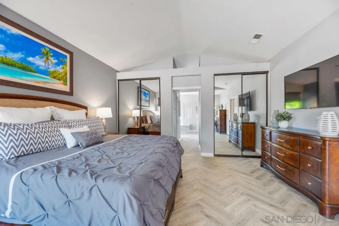 15735 Riparian Road Poway, CA 92064 - Photo 21 of 53 a bedroom with a bed and a dresser