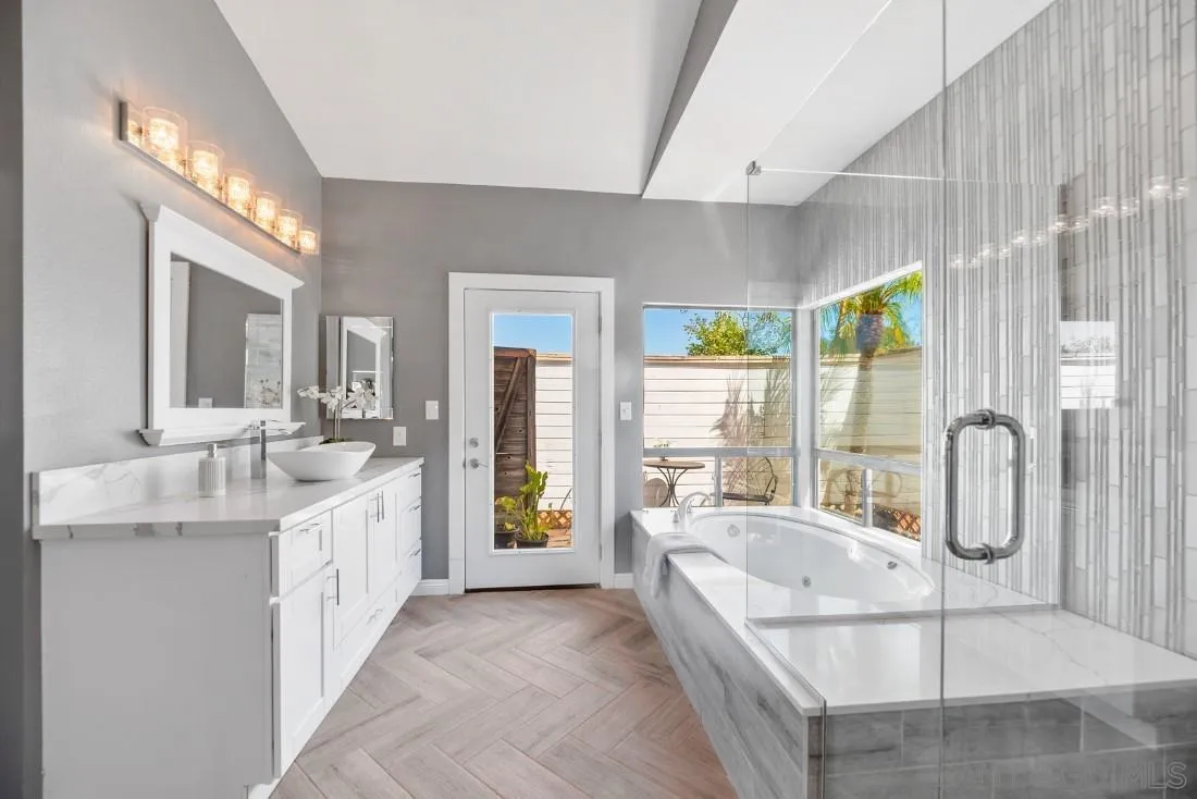 15735 Riparian Road Poway, CA 92064 - Photo 25 of 53 a large white kitchen with a large window