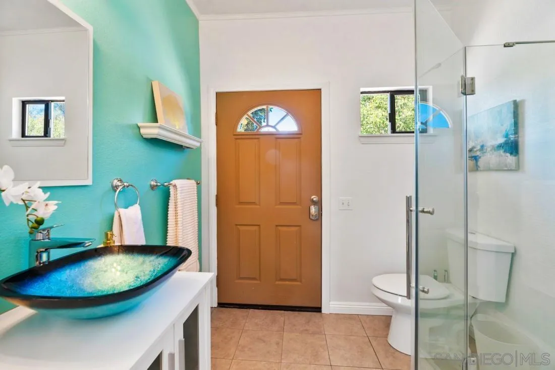 15735 Riparian Road Poway, CA 92064 - Photo 29 of 53 a bathroom with a granite countertop sink and a mirror