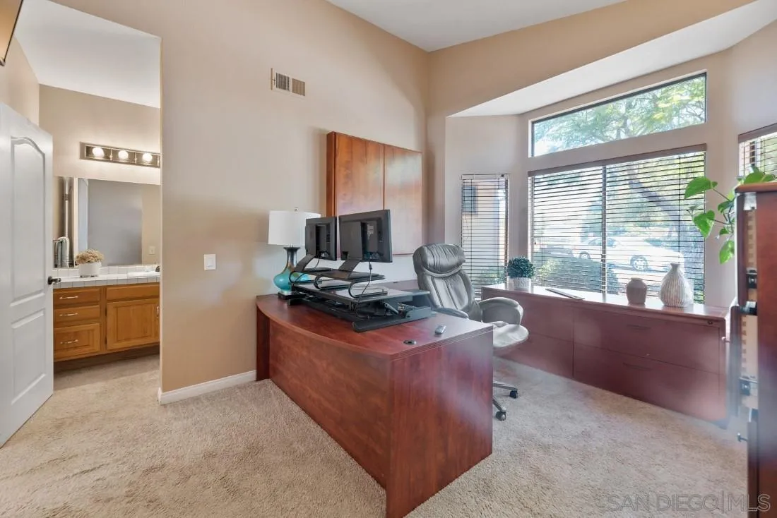 15735 Riparian Road Poway, CA 92064 - Photo 37 of 53 a living room with furniture and a large window