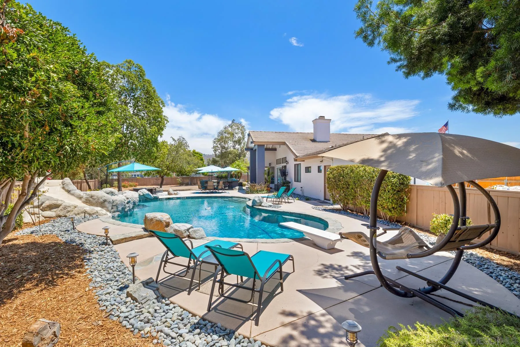 15735 Riparian Road Poway, CA 92064 - Photo 42 of 53 an outdoor sitting area with furniture and garden