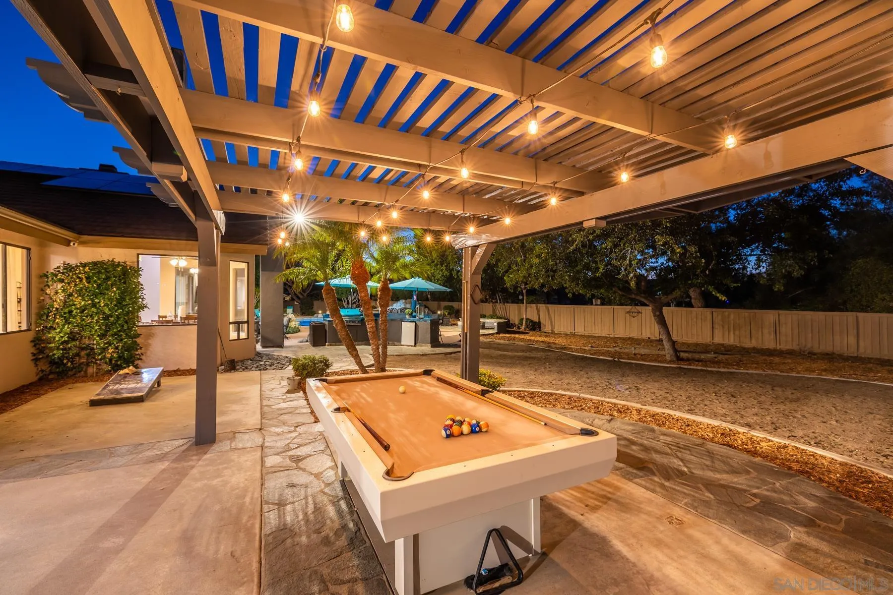 15735 Riparian Road Poway, CA 92064 - Photo 49 of 53 a view of a chairs and tables in patio