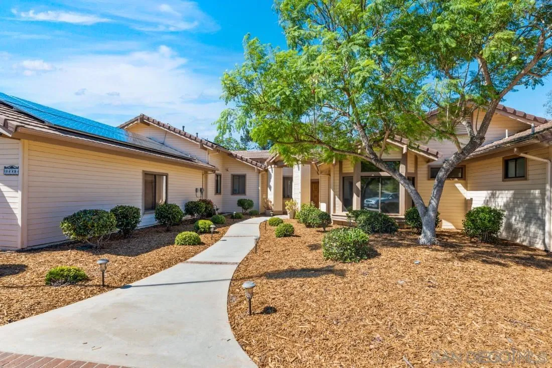 15735 Riparian Road Poway, CA 92064 - Photo 6 of 53 a front view of a house with garden and porch