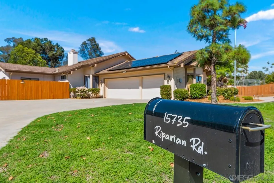 15735 Riparian Road Poway, CA 92064 - Photo 7 of 53 a view of a sign board with a yard