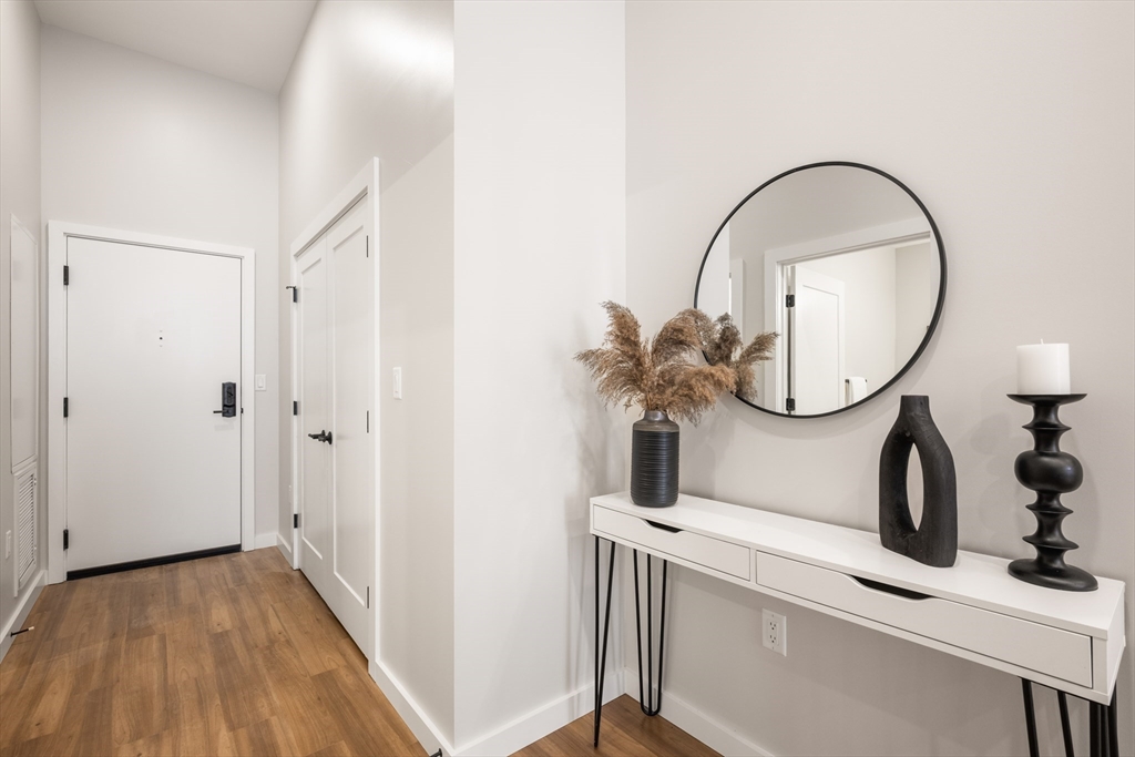 22 Elm Street, Unit 302 Worcester, MA 01608 - Photo 3 of 18 a view of an entryway with wooden floor