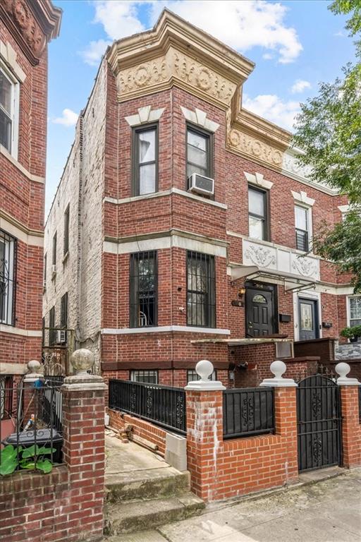a front view of a building with street