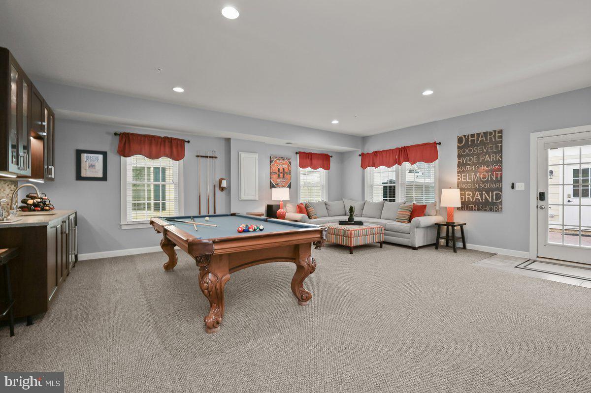 11285 Terrace Lane Fulton, MD 20759 - Photo 9 of 52 a living room with furniture and a flat screen tv