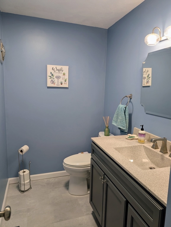 24 Charles Street, Unit 10 Douglas, MA 01516 - Photo 12 of 35 a bathroom with a sink and a toilet