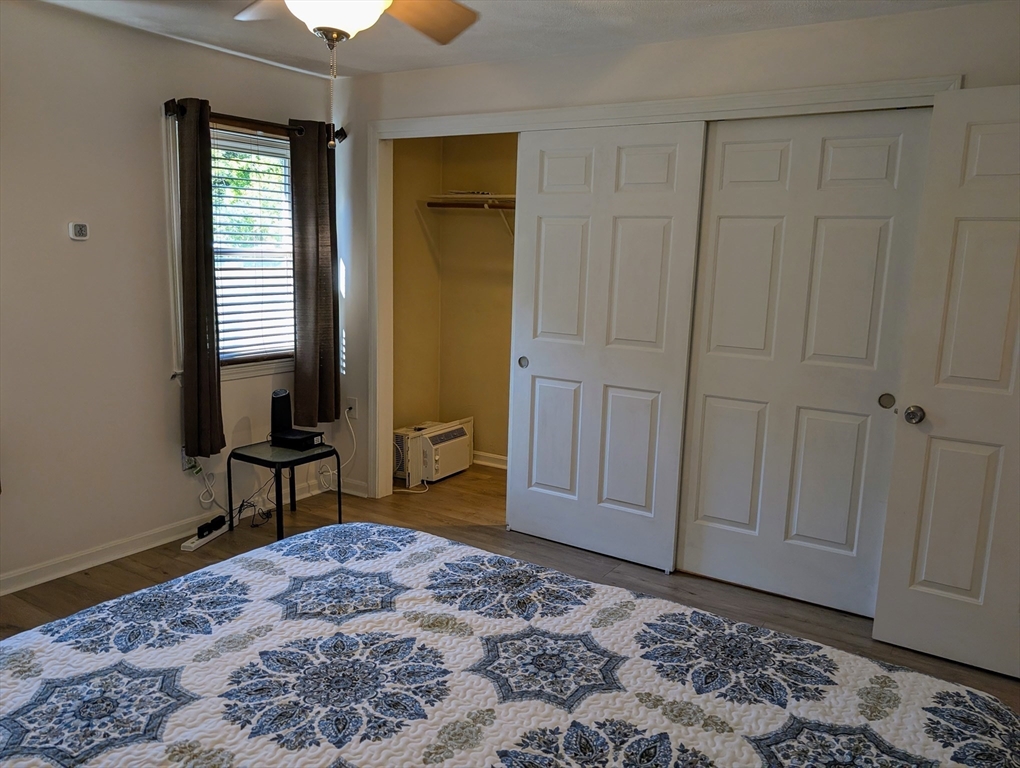 24 Charles Street, Unit 10 Douglas, MA 01516 - Photo 16 of 35 a bedroom with a bed and a window