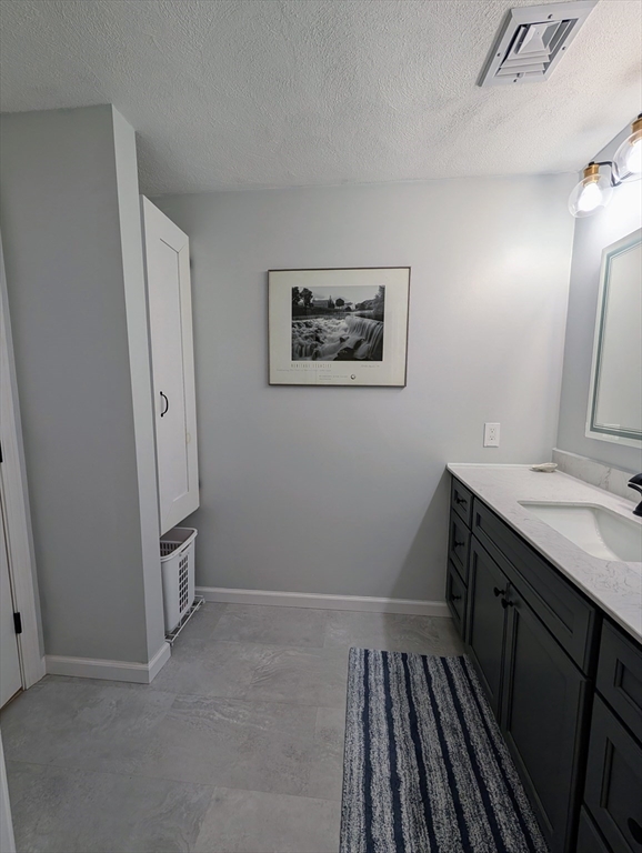 24 Charles Street, Unit 10 Douglas, MA 01516 - Photo 17 of 35 a view of a hallway with workspace